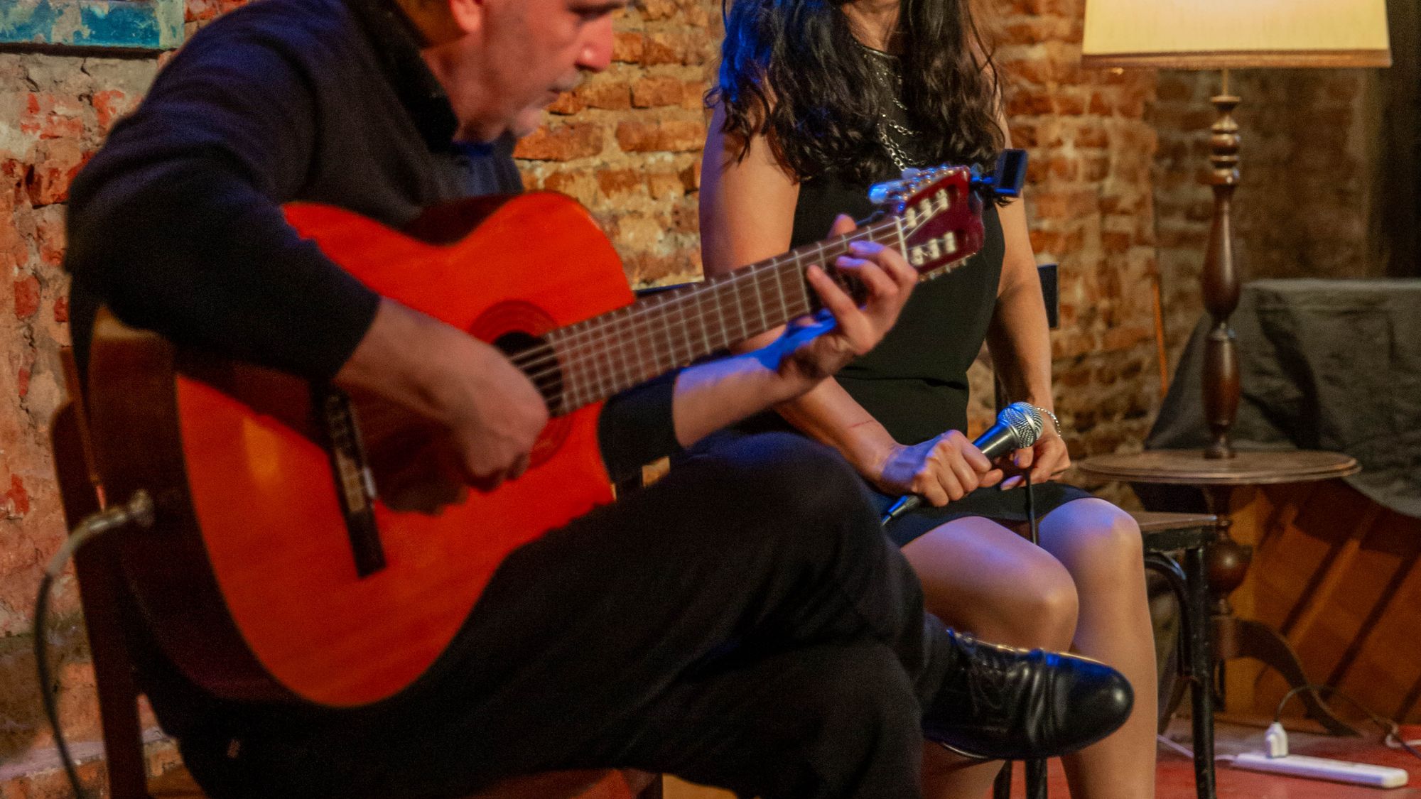 A live acoustic performance in a warm, intimate setting