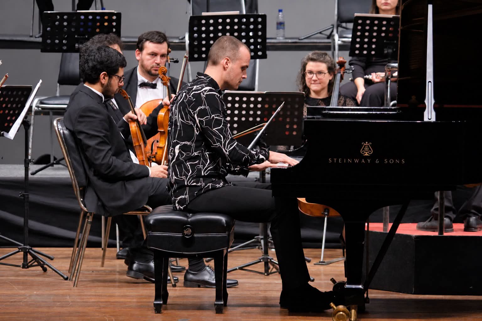 Concert pianist Ludovico Troncanetti performing at the piano
